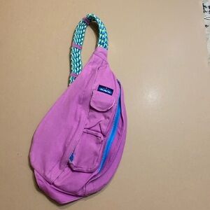 KAVU crossbody bag 21” light purple with yellow white and aqua rope strap.
